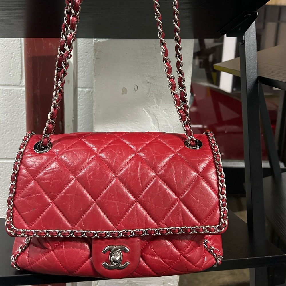 Red Chanel bag for sale. The bag is not brand new. The bag looks exactly as pic